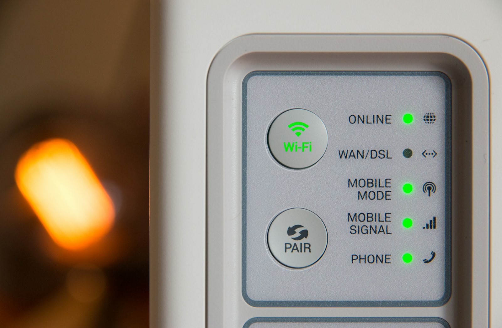 White modem router with status indicator lights