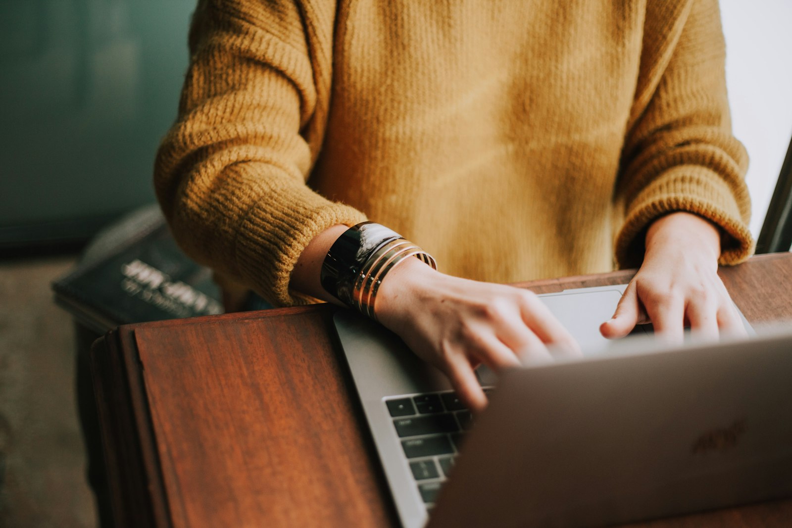 Person working from home on laptop using internet